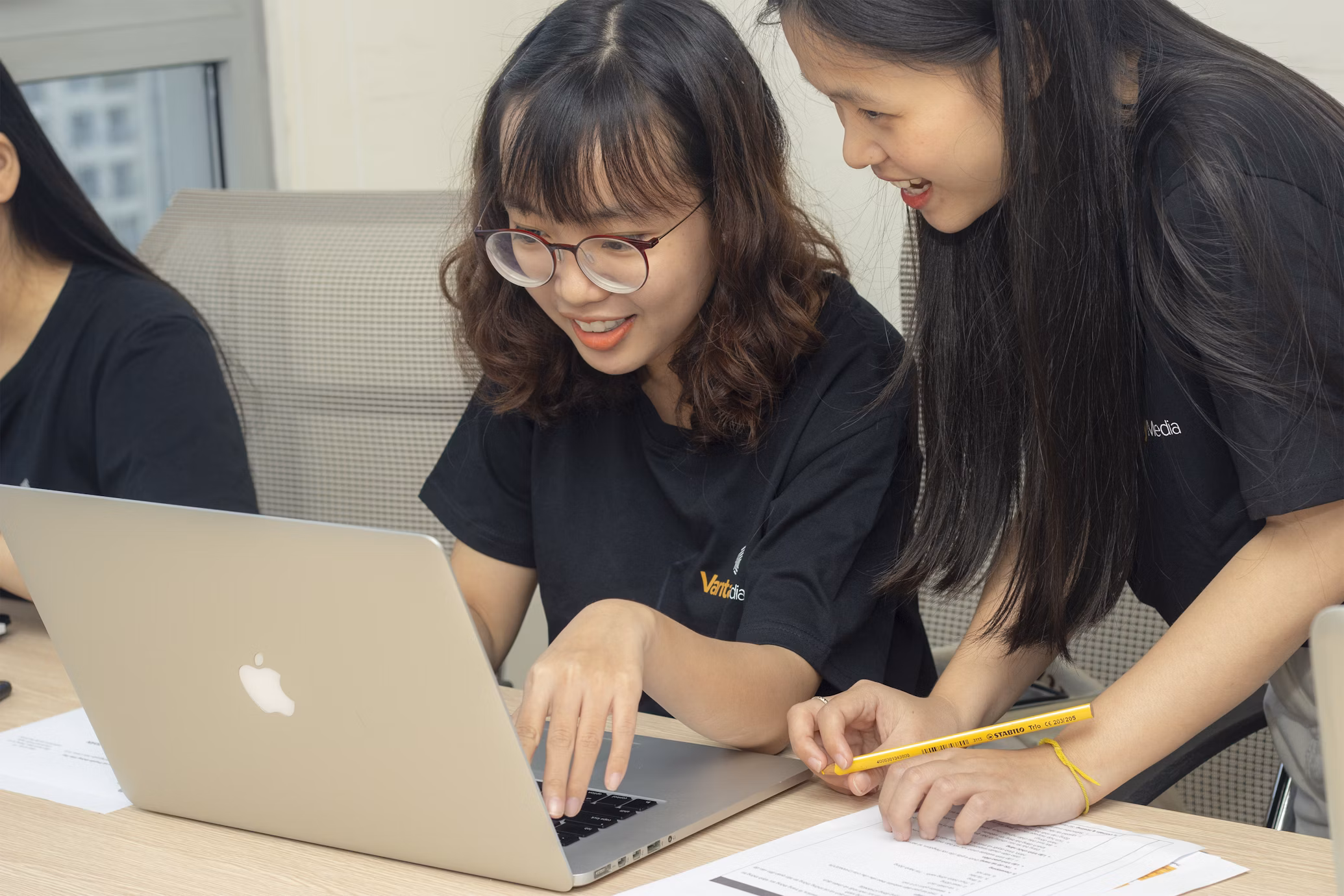 girl using laptop and getting homework help